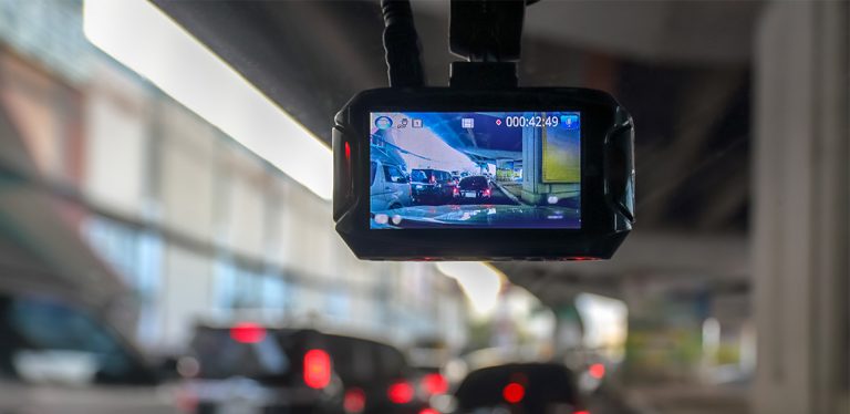 Camera mounted on inside of windshielde of a car